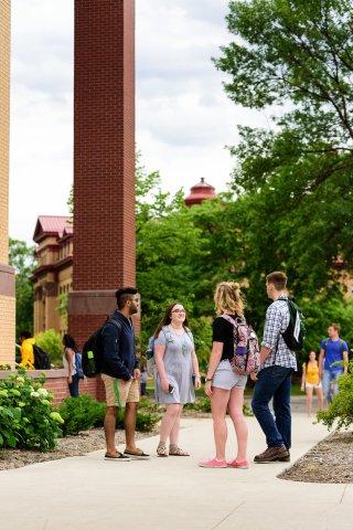 Students conversing outside classes